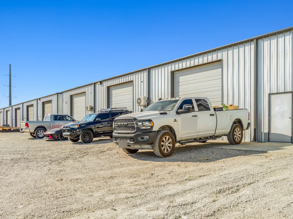 Anna, Texas: partners’ pickups at their roll-up doors