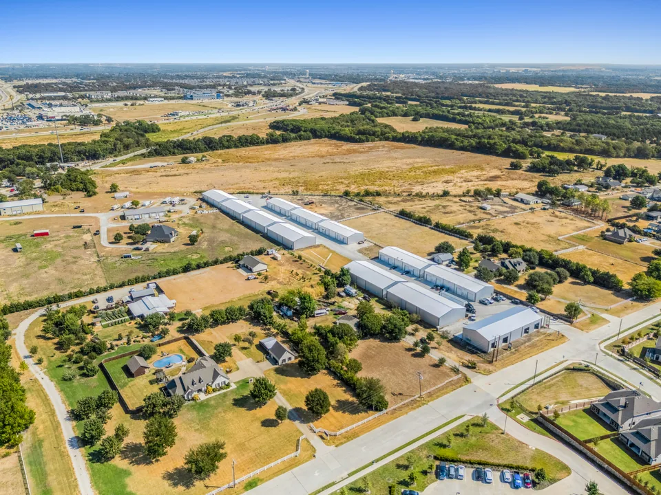 Melissa, Texas: the park’s rows from above, the SH-121 corridor behind