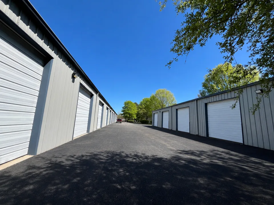 Toano, Virginia: the drive between two rows of white roll-up doors