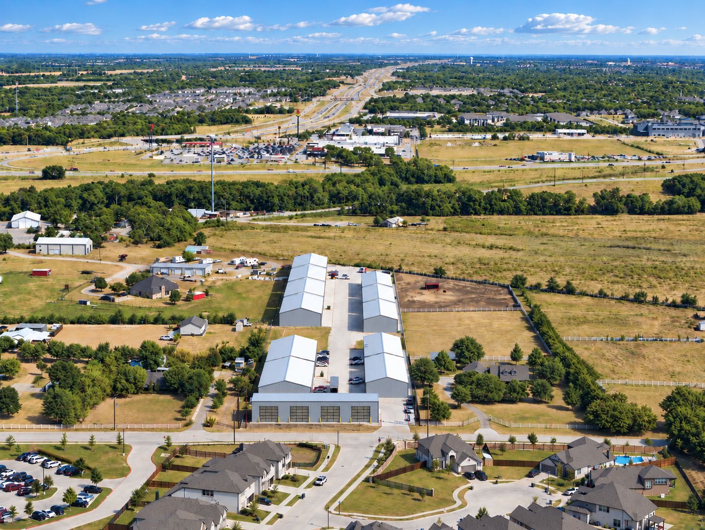 United Flex Melissa from above, with the US-75 corridor and new subdivisions behind it