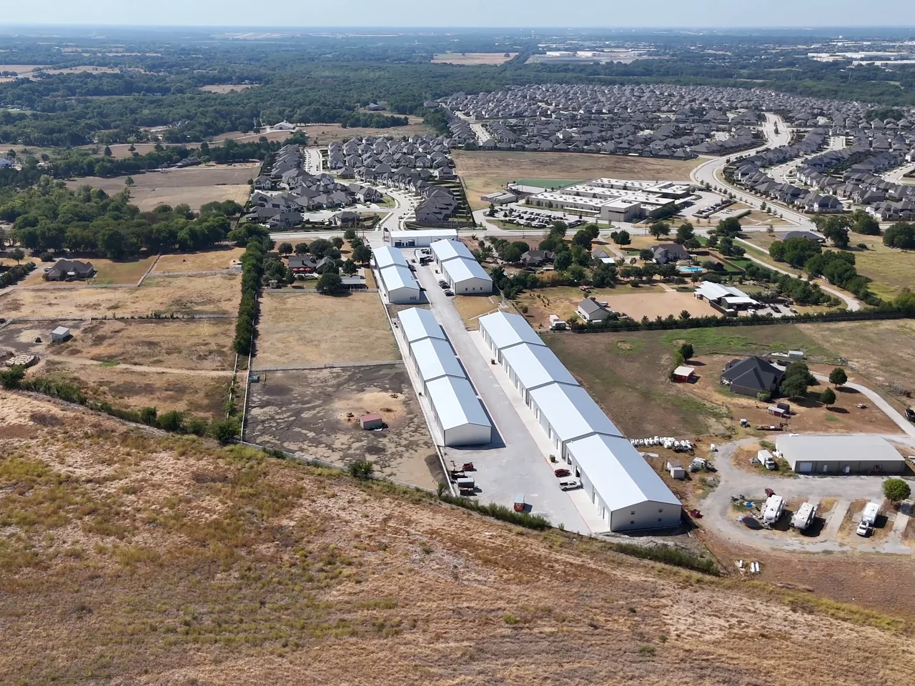 United Flex Melissa from the air: rows of bays running toward the road
