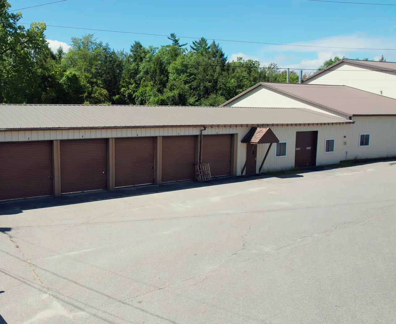 Six drive-in bay doors along one building at United Flex Westmoreland